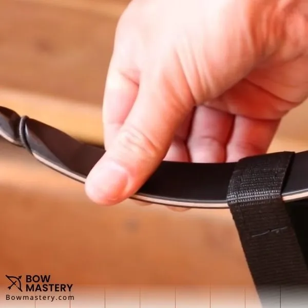 how to string a recurve bow - sliding string to groove